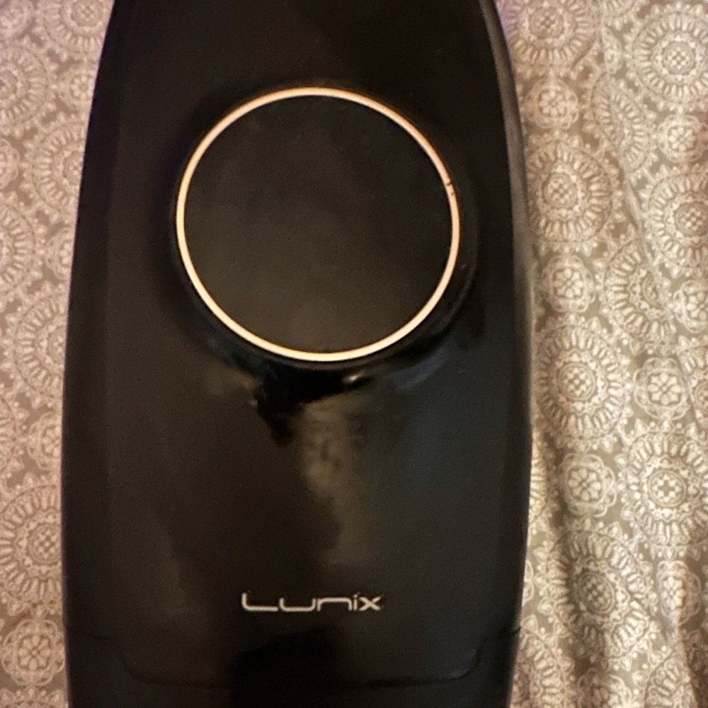 Lunix electric hand/wrist massager. Had multiple settings including heat
